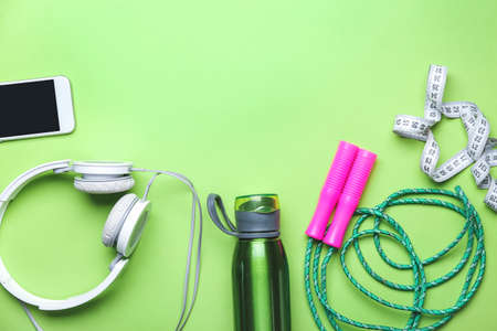 Set of sport equipment on color backgroundの写真素材