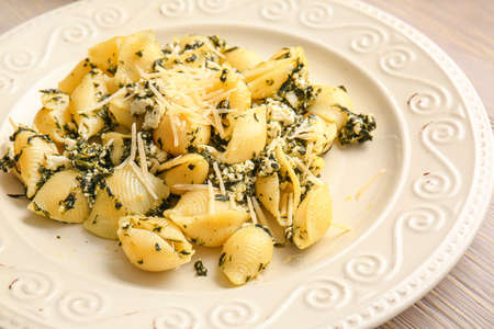 Plate with tasty conchiglie pasta, closeupの写真素材
