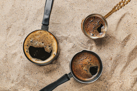 Turkish coffee cooked in sand, closeupの写真素材