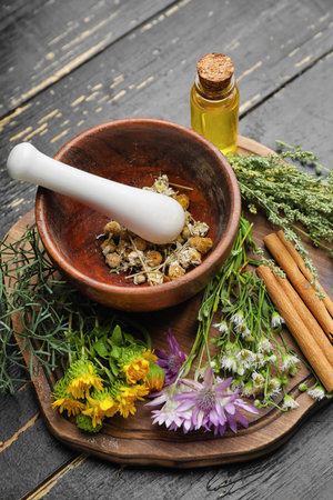 Beautiful composition with different herbs on dark wooden backgroundの写真素材