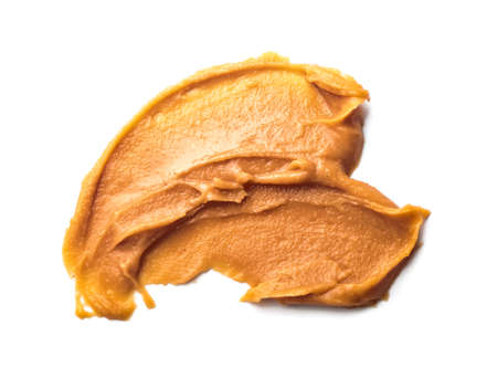 Tasty peanut butter isolated on white backgroundの写真素材