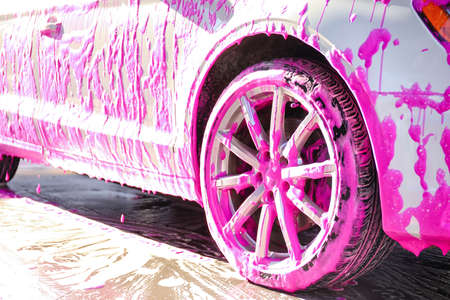 Modern automobile at car wash, closeupの写真素材