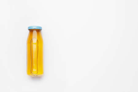 Bottle of juice on white background
