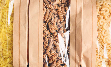 Bags with uncooked Italian pasta, closeupの写真素材
