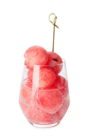 Tasty watermelon balls in glass on white backgroundの写真素材