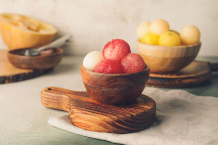 Tasty watermelon balls in bowls on tableの写真素材