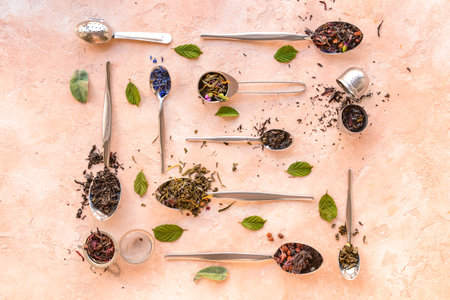 Composition with dry tea leaves on color background
