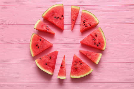 Frame made of slices of ripe watermelon on wooden backgroundの写真素材