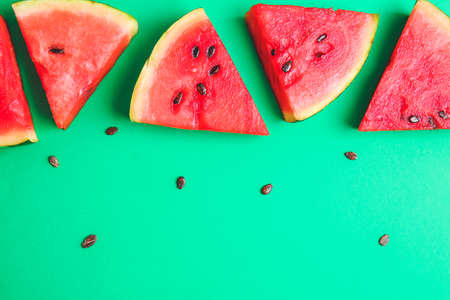 Slices of ripe watermelon color backgroundの写真素材