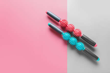 Body rollers on color background
