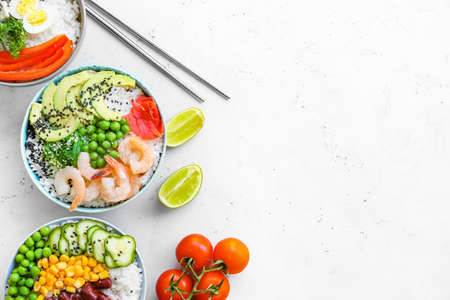 Different poke bowls on light background