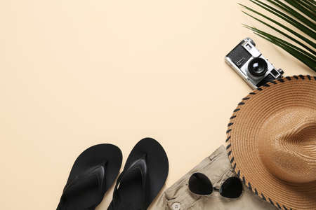 Set of male beach accessories on color backgroundの写真素材