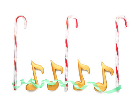 Music notes with Christmas decor isolated on white background