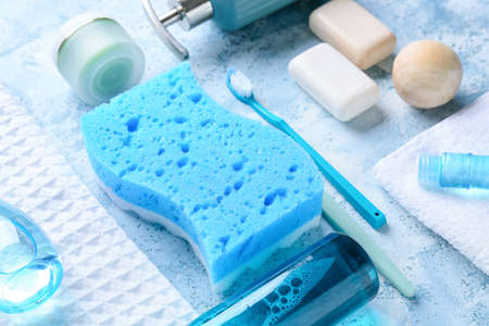 Composition with bath accessories and cosmetics on color backgroundの写真素材