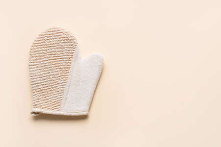 Massage glove on light backgroundの写真素材