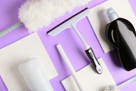 Set of cleaning supplies on color backgroundの写真素材