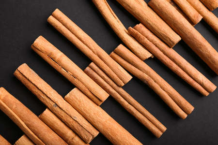 Cinnamon sticks on dark background