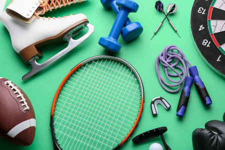 Set of sport equipment on color backgroundの写真素材