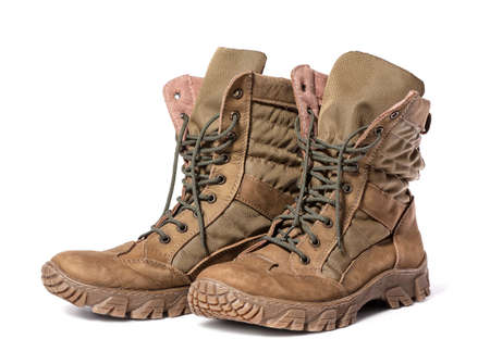 Military boots on white background