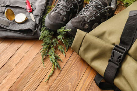 Equipment for hiking on wooden tableの写真素材