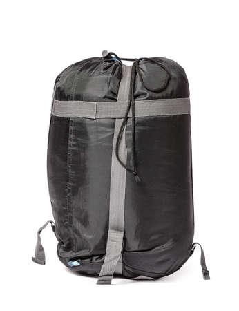 Packed sleeping bag on white backgroundの写真素材
