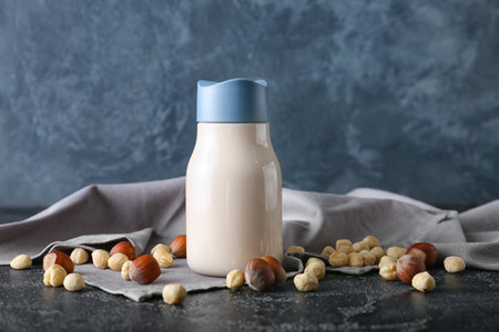 Bottle of vegan milk on dark backgroundの写真素材