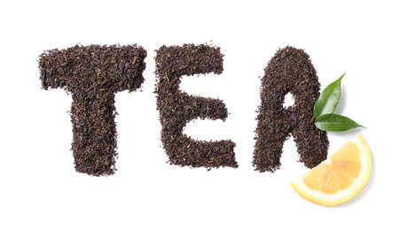 Word TEA made of dry leaves on white backgroundの写真素材