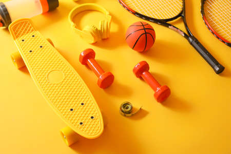 Set of sports equipment on color backgroundの写真素材