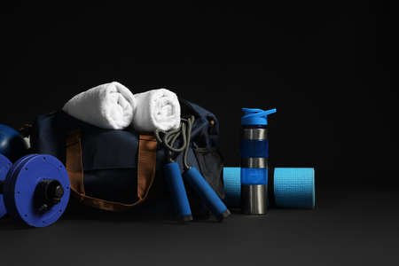 Set of sports equipment on dark backgroundの写真素材