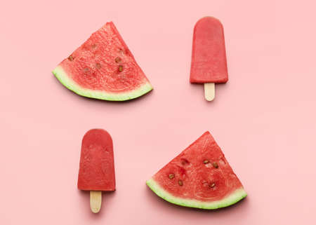 Tasty watermelon ice-cream on color backgroundの写真素材
