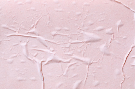 Texture of creased wet paper as backgroundの写真素材