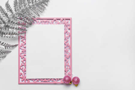 Beautiful Christmas decorations with empty card on white backgroundの写真素材