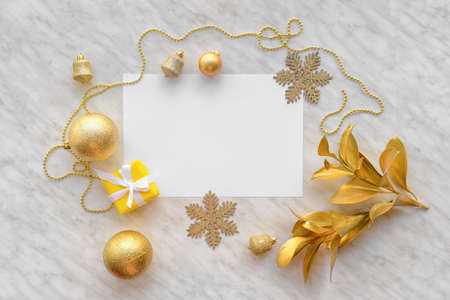 Beautiful Christmas decorations with empty card on white backgroundの写真素材