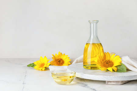 Bottle of sunflower oil on tableの写真素材