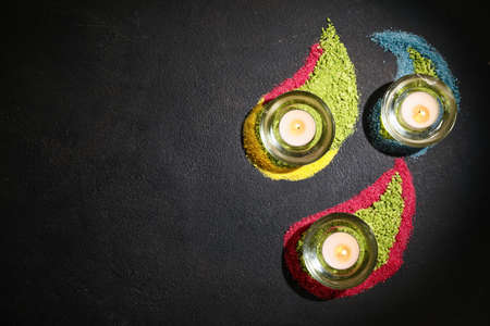 Burning candles for celebration of Divaly on dark backgroundの写真素材