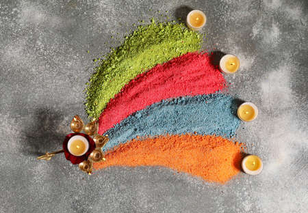 Festive composition with diya lamp for celebration of Divaly on gray backgroundの写真素材