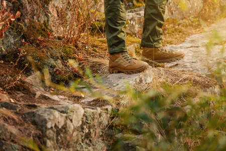 Young male tourist in mountainsの写真素材