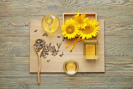 Composition with sunflower oil on wooden backgroundの写真素材
