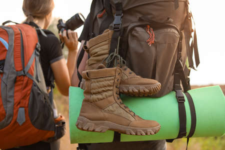 Couple of young tourists in countrysideの写真素材