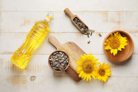 Composition with sunflower oil on wooden backgroundの写真素材