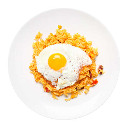 Plate with tasty egg and rice on white backgroundの写真素材