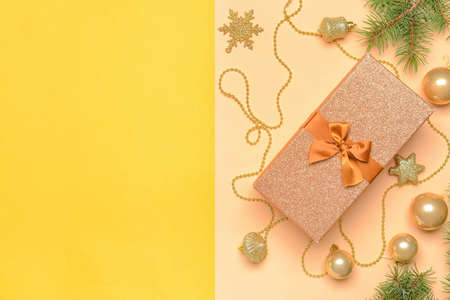 Christmas composition with gift on color backgroundの写真素材