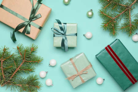 Christmas composition with gifts on color backgroundの写真素材