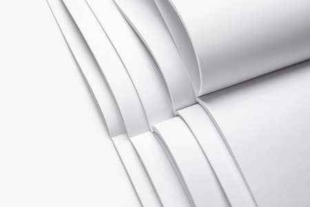 Open blank magazines on white backgroundの写真素材