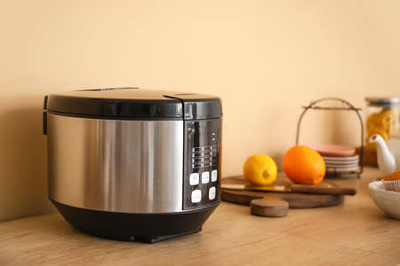 Modern multicooker on kitchen counterの写真素材