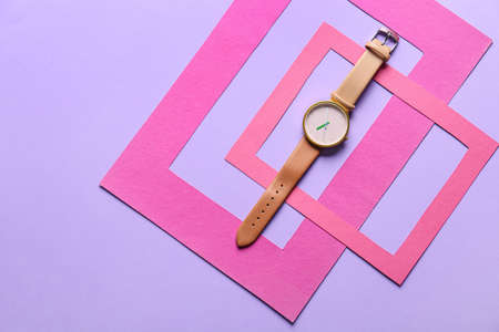 Stylish wrist watch on color backgroundの写真素材