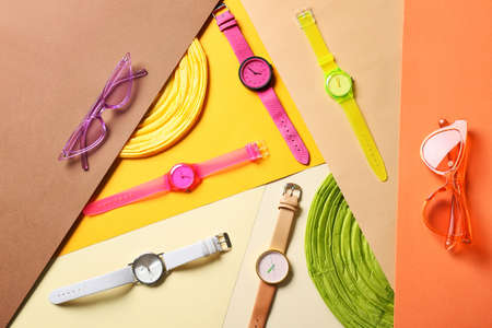 Composition with stylish wrist watches on color backgroundの写真素材