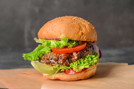 Tasty burger on dark backgroundの写真素材