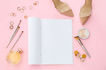 Composition with blank magazine and female accessories on color backgroundの写真素材