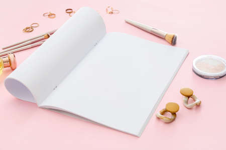 Composition with blank magazine and female accessories on color backgroundの写真素材